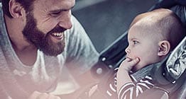 man with baby closesup